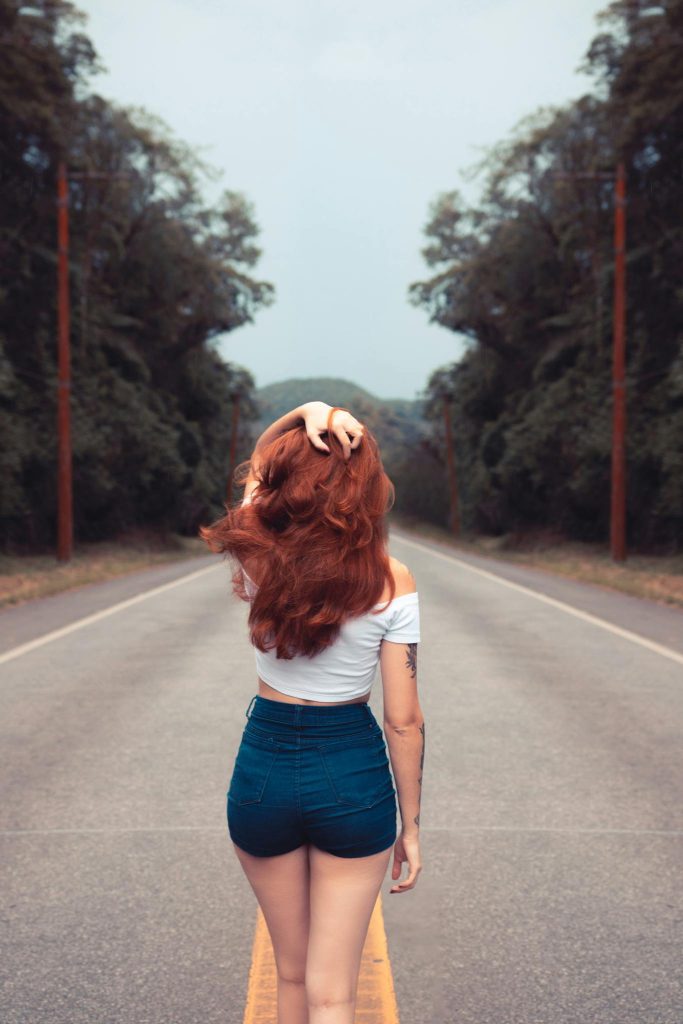 Woman Standing on Road